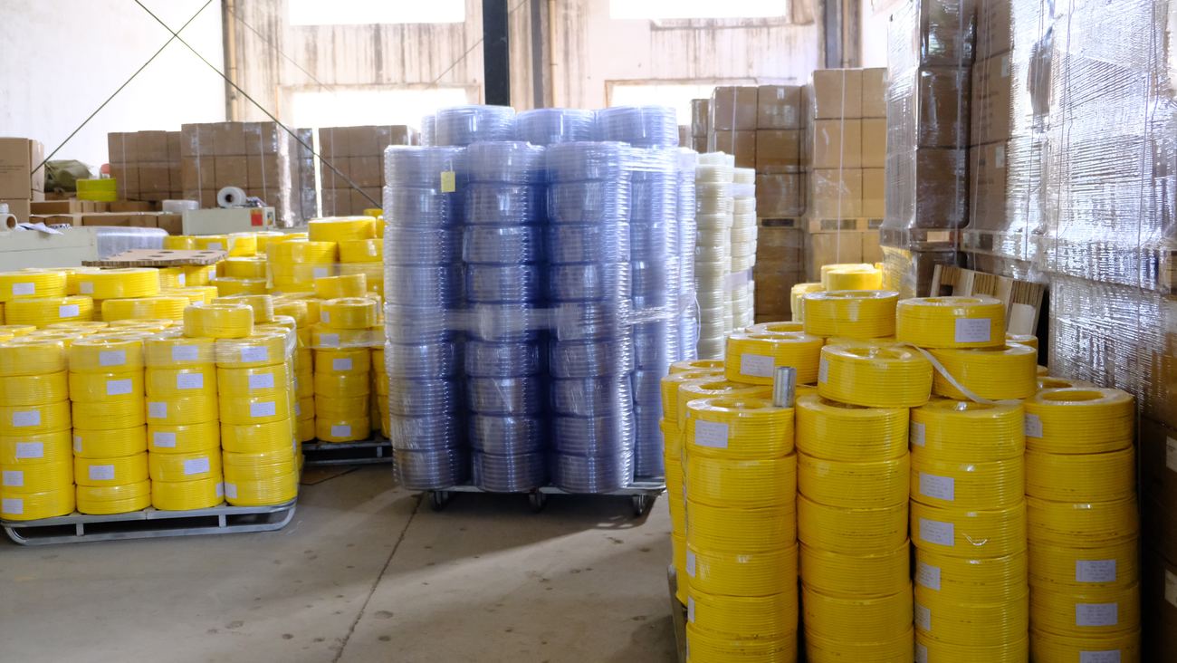 Finished PVC hose rolls in warehouse